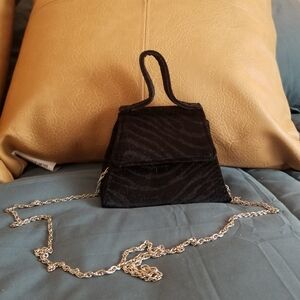 Super mini trapezoid bag by Urban Outfitters